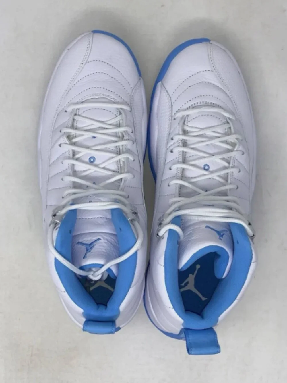 Air Jordan 12 'Melo UNC University Blue' White Sneakers